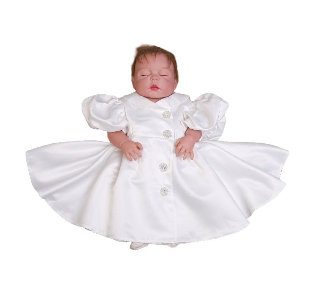 Baby in a white dress with puffed sleeves on a white background meejoy.com.au