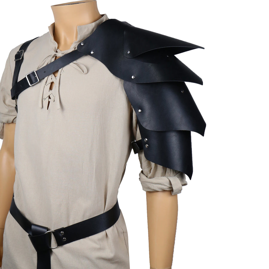 MEEJOY layered medieval shoulder pauldron displayed over a lace-up beige tunic